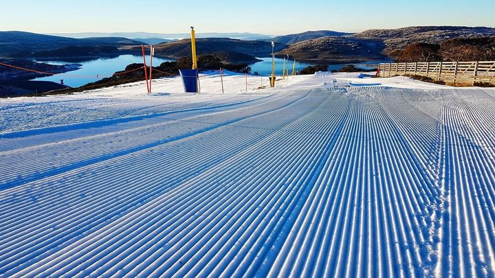 The grooves are created by snow grooming machines and are known colloquially as "corduroy".