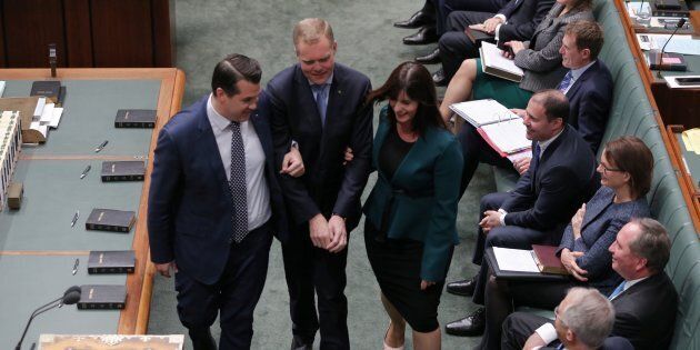 Speaker Tony Smith is dragged to the chair by Michael Sukkar and Lucy Wicks