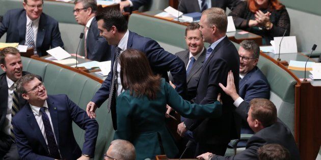 Speaker Tony Smith is dragged to the chair by Michael Sukkar and Lucy Wicks
