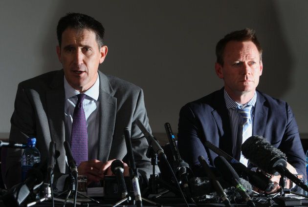 Howard, right, alongside Cricket Australia chief executive James Sutherland.
