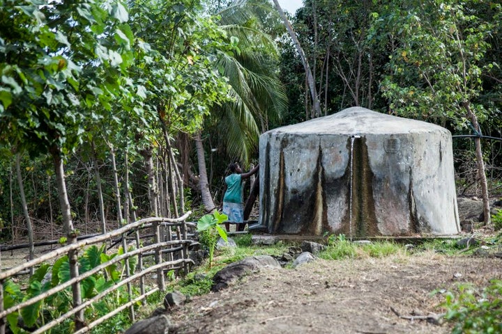 Irrigated water from a nearby creek runs into this tank for the village to drink and wash.