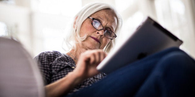 senior woman using tablet