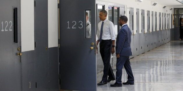 U.S. President Barack Obama is shown the inside of a cell as he visits the El Reno Federal Correctional Institution in El Reno, Oklahoma, on July 16, 2015. Obama commuted the sentences of 111 federal prisoners on Tuesday.