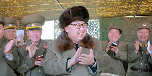 North Korean leader Kim Jong Un claps during a demonstration of a new large-caliber multiple rocket launching system at an unknown location, in this undated photo released by North Korea's Korean Central News Agency (KCNA) on March 22, 2016. REUTERS/KCNA/File Photo ATTENTION EDITORS - THIS PICTURE WAS PROVIDED BY A THIRD PARTY. REUTERS IS UNABLE TO INDEPENDENTLY VERIFY THE AUTHENTICITY, CONTENT, LOCATION OR DATE OF THIS IMAGE. FOR EDITORIAL USE ONLY. NOT FOR SALE FOR MARKETING OR ADVERTISING CAMPAIGNS. THIS PICTURE IS DISTRIBUTED EXACTLY AS RECEIVED BY REUTERS, AS A SERVICE TO CLIENTS. NO THIRD PARTY SALES. SOUTH KOREA OUT. NO COMMERCIAL OR EDITORIAL SALES IN SOUTH KOREA