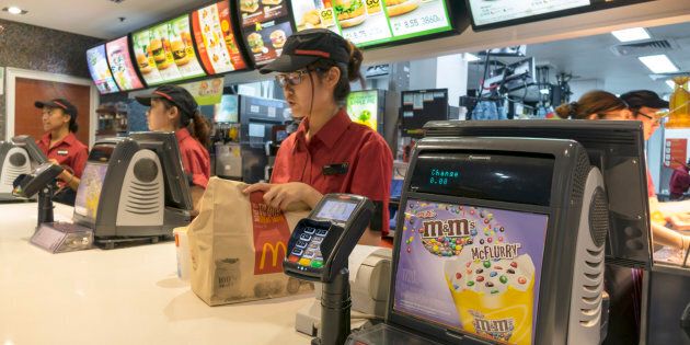 Fast food workers are among those getting their pay trimmed.
