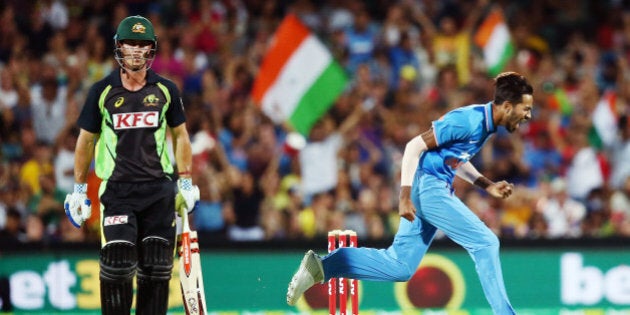 ADELAIDE, AUSTRALIA - JANUARY 26: Hardik Pandya of India celebrates after taking the wicket of Chris Lynn of Australia during game one of the Twenty20 International match between Australia and India at Adelaide Oval on January 26, 2016 in Adelaide, Australia. (Photo by Morne DeKlerk - CA/Cricket Australia/Getty Images)