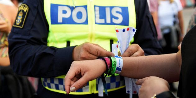 Police officers handed out bracelets with the words