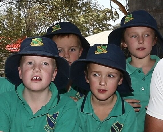 Little Kids Were Super Unimpressed By Tony Abbott Gave Them A Copy Of His