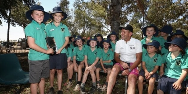 Little Kids Were Super Unimpressed By Tony Abbott Gave Them A Copy Of His