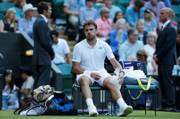 Injured and all iced-up, Wawrinka was knocked out in the first round.