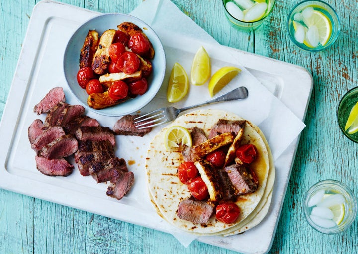 Portion the lamb, halloumi and cherry tomatoes into plastic containers, and heat up and serve with the wraps at work.