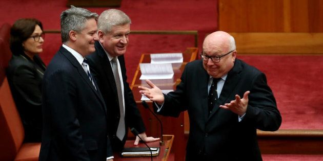 Attorney-General George Brandis says he does not want to confuse the issue of donations