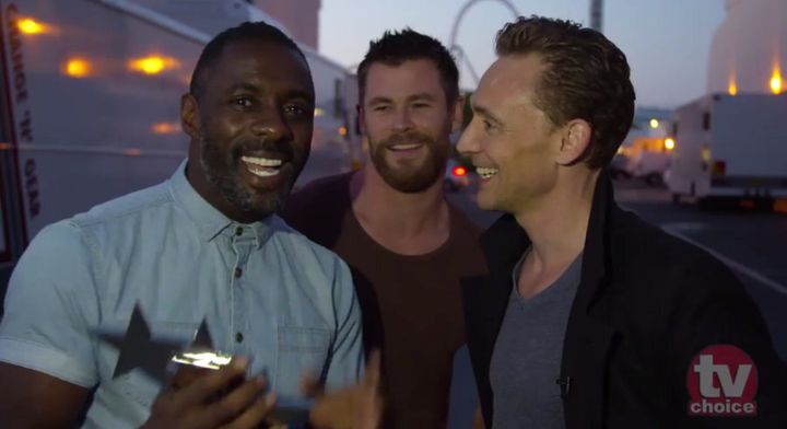 Elba, Hemsworth and Hiddleston... obviously having a terrible time.
