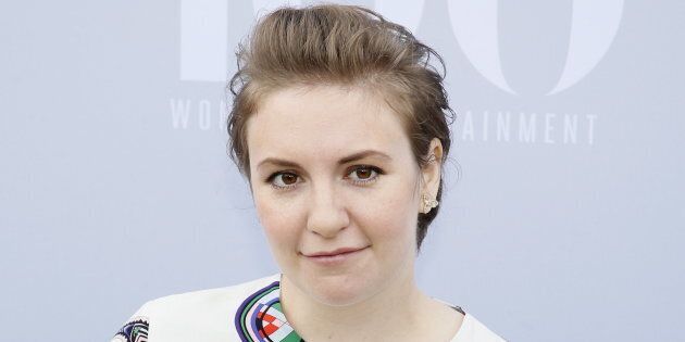 Lena Dunham poses at The Hollywood Reporter's Annual Women in Entertainment Breakfast in Los Angeles.