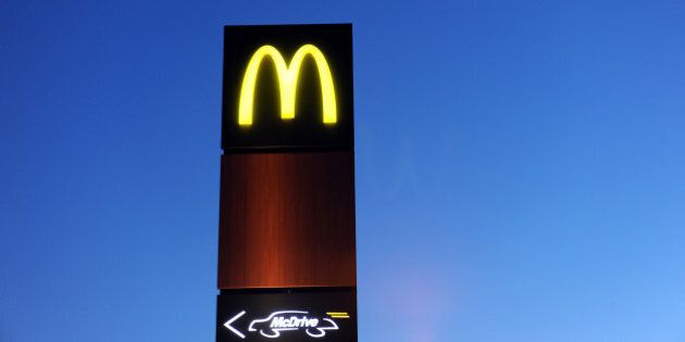 The neon sign of a Mac Donald's burger restaurant and a Mc Drive sign are pictured February 20, 2013 in Douarnenez, western of France. AFP PHOTO FRED TANNEAU (Photo credit should read FRED TANNEAU/AFP/Getty Images)
