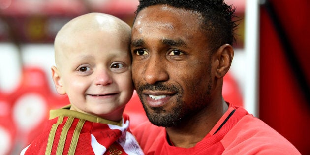 Bradley Lowrey (L) and Jermain Defoe of Sunderland (R) pre-match during the Premier League match between Sunderland and Chelsea at Stadium of Light on December 14, 2016 in Sunderland, England.