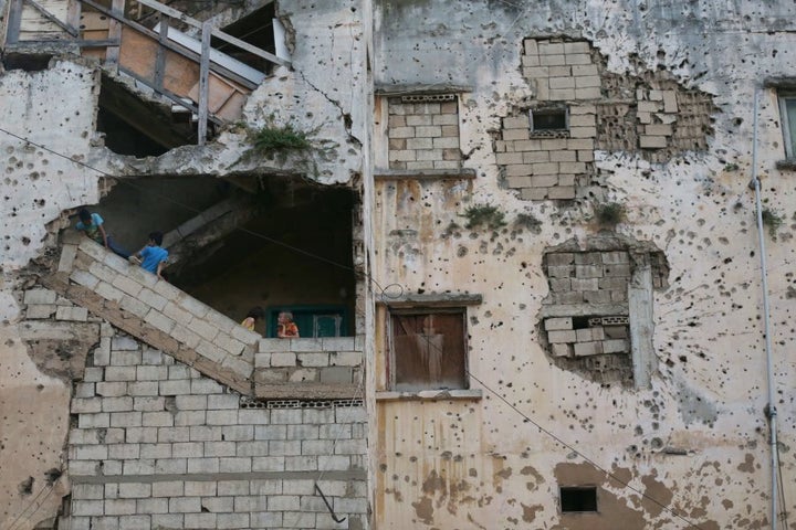 Syrian refugee children who have been forced to leave their homes due to the ongoing war, are seen inside the abandoned buildings in Beirut, Lebanon on August 04, 2016. Some of the Syrian refugees fled to Lebanon during the Syrian Civil War.