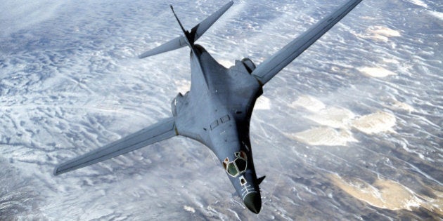 WY - APRIL 1: This undated picture shows a B-1B Lancer bomber flying over Wyoming. The US Department of the Defense has reported that a B-1B similar to these pictured crashed 12 December, 2001 30 miles off from Diego Garcia with a crew of four, who have been rescued. (Photo credit should read DOUGLAS C. BRUNELLE/AFP/Getty Images)