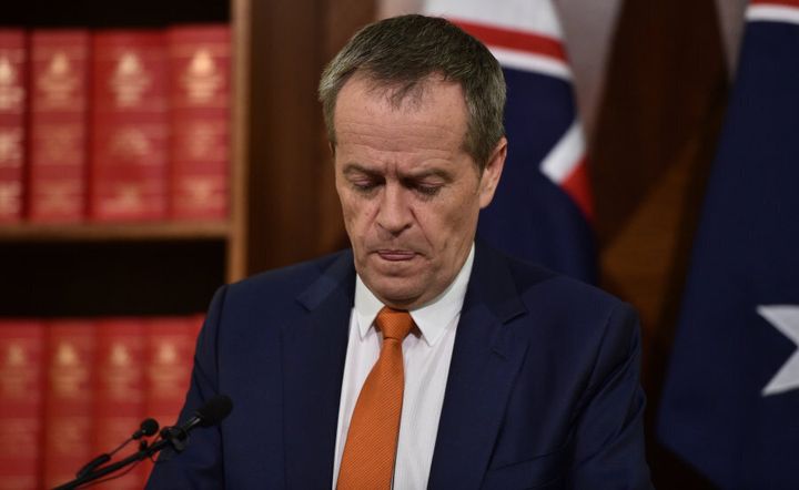 Australian Labor Party leader Bill Shorten has promised to "look constructively" at the government's omnibus savings bill, amid reports of a "rear-guard action" to oppose some measures inside the ALP.