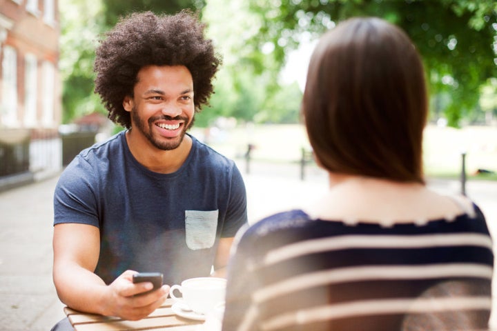 Unless you're showing your date a cute cat video, get off the phone.