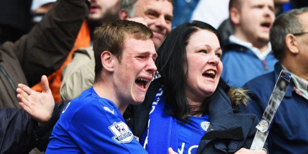 LEICESTER, ENGLAND - APRIL 03: Leicester City fans show their emotions as they celebrate victory after the Barclays Premier League match between Leicester City and Southampton at The King Power Stadium on April 3, 2016 in Leicester, England. (Photo by Laurence Griffiths/Getty Images)