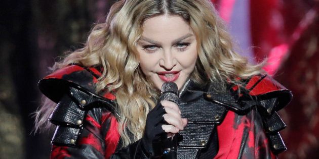 U.S. singer Madonna performs during the Rebel Heart World Tour in Macau, China, Saturday, Feb. 20, 2016. (AP Photo/Kin Cheung)