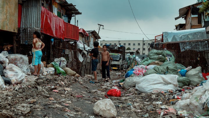 The streets of Happyland are littered with rubbish.