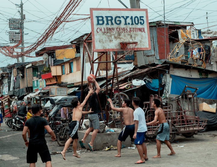 Youths play basketball at least 12 hours a day at Happyland.