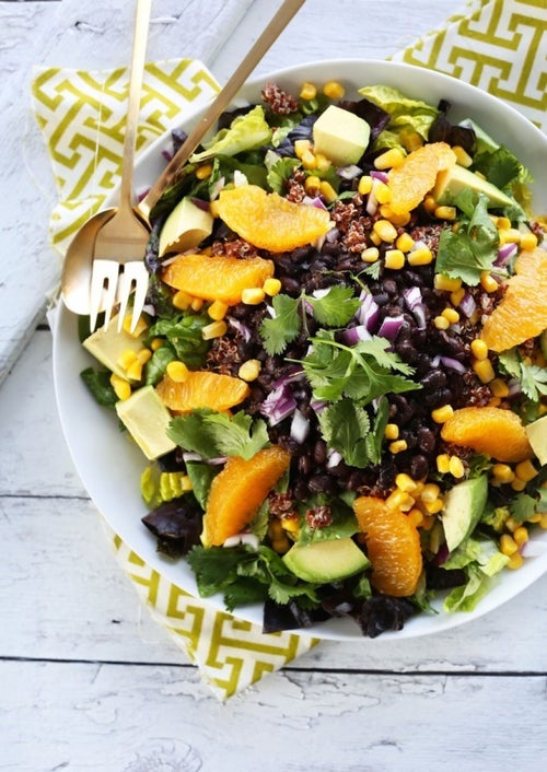 mexican quinoa salad with orange lime dressing Mexican Quinoa Salad! So vibrant, fresh, and EASY to prepare. It's tossed in a cumin-lime dressing and is great served with avocado. Plus it's an awesome dish made in advance