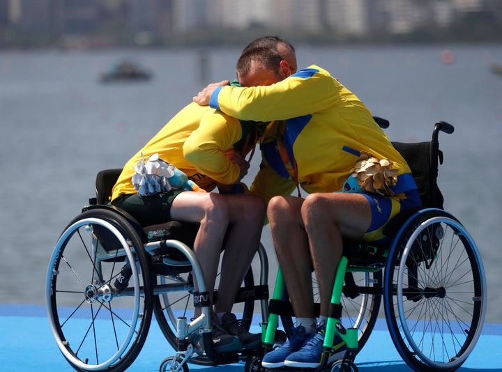 That would be gold medallist Roman Polianskyi (R) of Ukraine hugging silver medalist Erik Horrie of Australia after the men's single scull ASM1X victory ceremony in Rio.