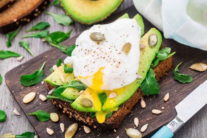 Eggs (protein), good-quality carbs (rye bread) and healthy fats (avocado).