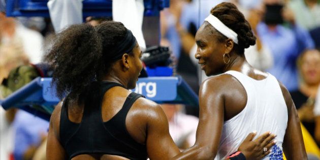 NEW YORK, NY - SEPTEMBER 08: Serena Williams (L) of the United States hugs Venus Williams of the United States after defeating her in their Women's Singles Quarterfinals match on Day Nine of the 2015 US Open at the USTA Billie Jean King National Tennis Center on September 8, 2015 in the Flushing neighborhood of the Queens borough of New York City. (Photo by Al Bello/Getty Images)