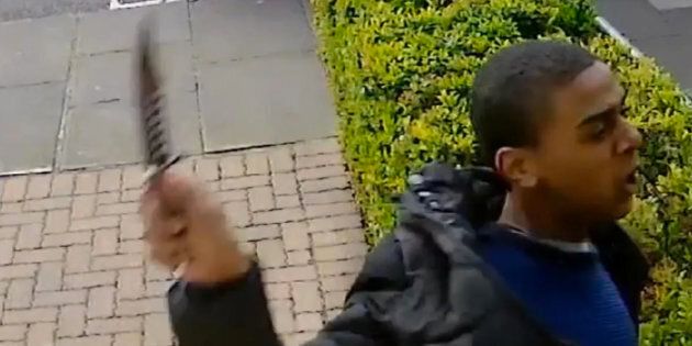 The man caught on CCTV slashing a 21-year-old man across the face with a knife