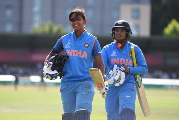 That's Harmanpreet on the left, looking satisfied with her day's work of humiliating Australia's bowlers.