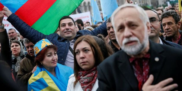 People gather to commemorate the anniversary of the deportation of Crimean Tatars from Crimea to Central Asia in 1944, in Independence Square in Kiev, Ukraine, May 18, 2016.