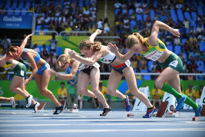 That's Holt on the right of shot. The winner, Xia Zhou of China, is out of shot on the left. Holt led for about 90 metres.