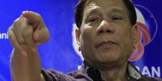 Rodrigo Duterte, a seven-term Philippine mayor, gestures while making a point during a ceremony proclaiming him as a presidential candidate at a hotel in Manila November 30, 2015. REUTERS/Romeo Ranoco