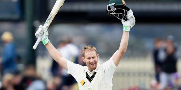 Australia's Adam Voges celebrates getting his double century against the West Indies during their cricket test match in Hobart, Australia, Friday Dec. 11, 2015. (AP Photo/Andy Brownbill).