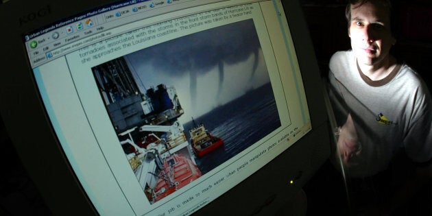 Snopes owner David Mikkelson poses next to a doctored storm photo. He is at the center of a legal battle for control over the popular fact-checking site.