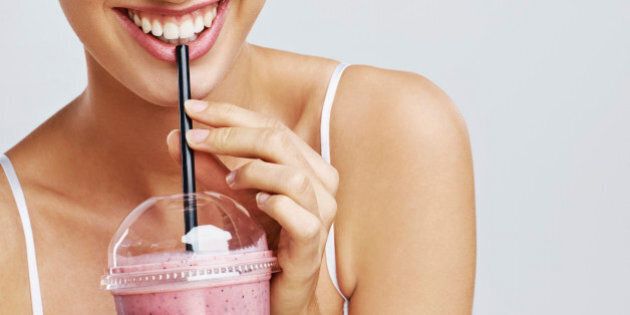 Attractvie smiling woman drinking a health shakehttp://195.154.178.81/DATA/istock_collage/0/shoots/784369.jpg