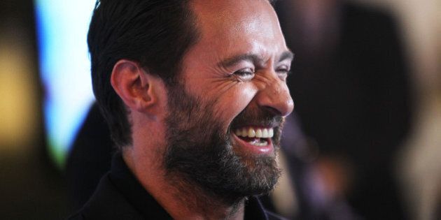 MELBOURNE, AUSTRALIA - MARCH 29: Hugh Jackman smiles he arrives on the red carpet ahead of the Eddie The Eagle screening at Village Cinemas Crown on March 29, 2016 in Melbourne, Australia. (Photo by Graham Denholm/Getty Images)