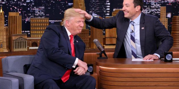 Republican Presidential Nominee Donald Trump gets a head rub during an interview with Jimmy Fallon on Sept. 15, 2016.