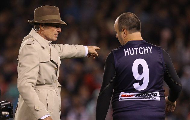This image of Sam Newman showing Craig Hutchison where to go in a the 2011 E.J Whitten Legends Game is kind of ironic now.