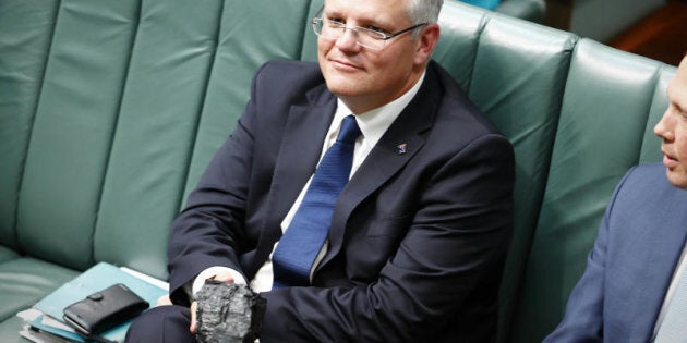 Treasurer Scott Morrison with a lump of coal during Question Time.