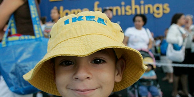 Pablo Bermudez, 5, waits in line for the Ikea Store in Sunrise, Fla. to open its doors Wednesday, Oct. 17, 2007. The Swedish home furnishings chain opened its first Florida store, bringing inexpensive furniture, housewares and Swedish meatballs to the state as part of its U.S. expansion. (AP Photo/J. Pat Carter)