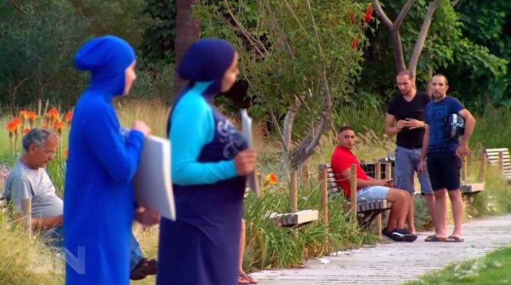 French locals look at Zeynab Alshelh.