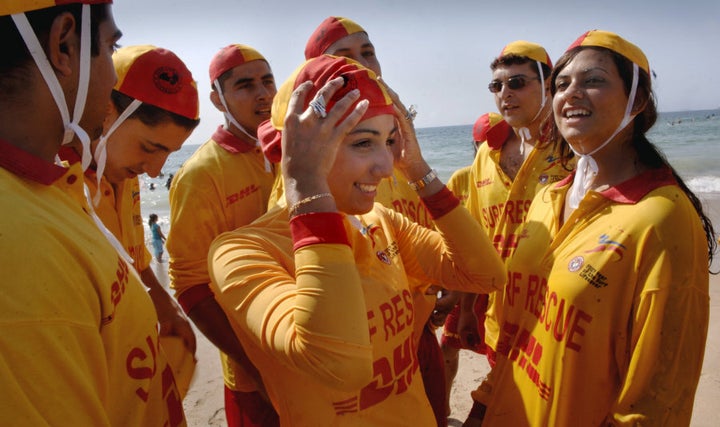 Volunteer lifeguard Mecca Laalaain a burkini uniform.