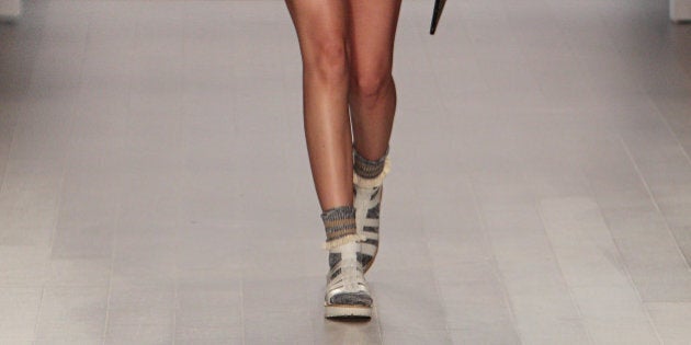 Socks and sandals bring whiff of scandal to Paris catwalk