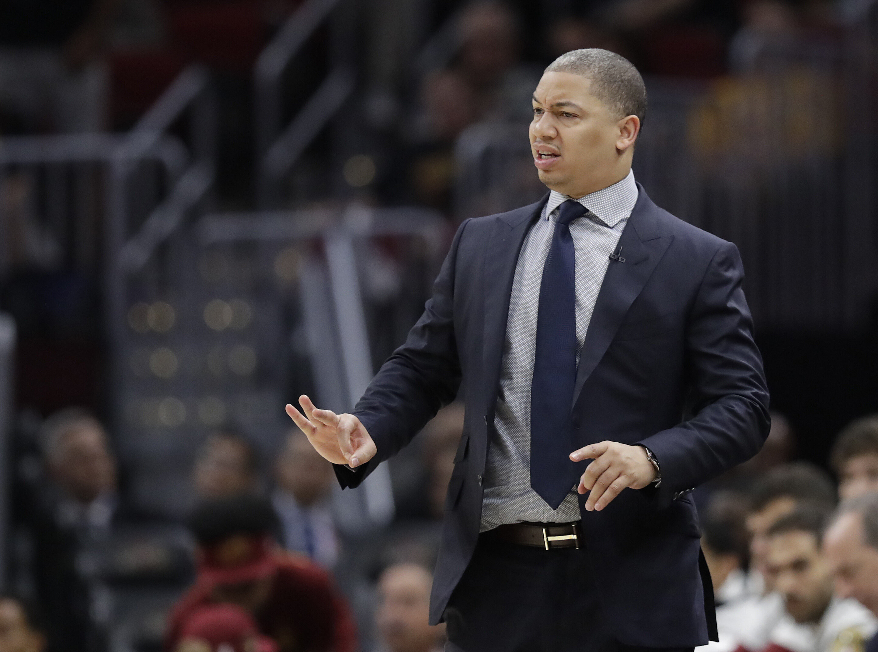 Cleveland Cavaliers coach Tyronn Lue calls a play during the second half of Game 4 of basketball's NBA Finals against the Golden State Warriors, Friday, June 8, 2018, in Cleveland. (AP Photo/Tony Dejak)