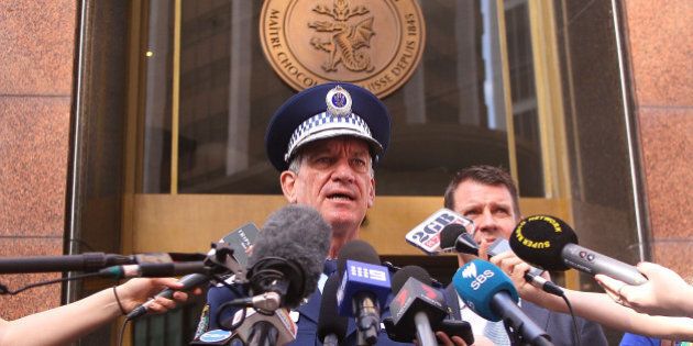 SYDNEY, AUSTRALIA - DECEMBER 15: NSW Police Commissioner Andrew Scipione talks to the media outside the Lindt Cafe in Martin Place on December 15, 2015 in Sydney, Australia. Today marks the first anniversary of the deaths Katrina Dawson and Tori Johnson, who were killed along with the gunman following a 17-hour siege at the cafe in 2014. (Photo by Matt Blyth/Getty Images)